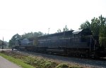 CSX 7815 leads a train towards the yard